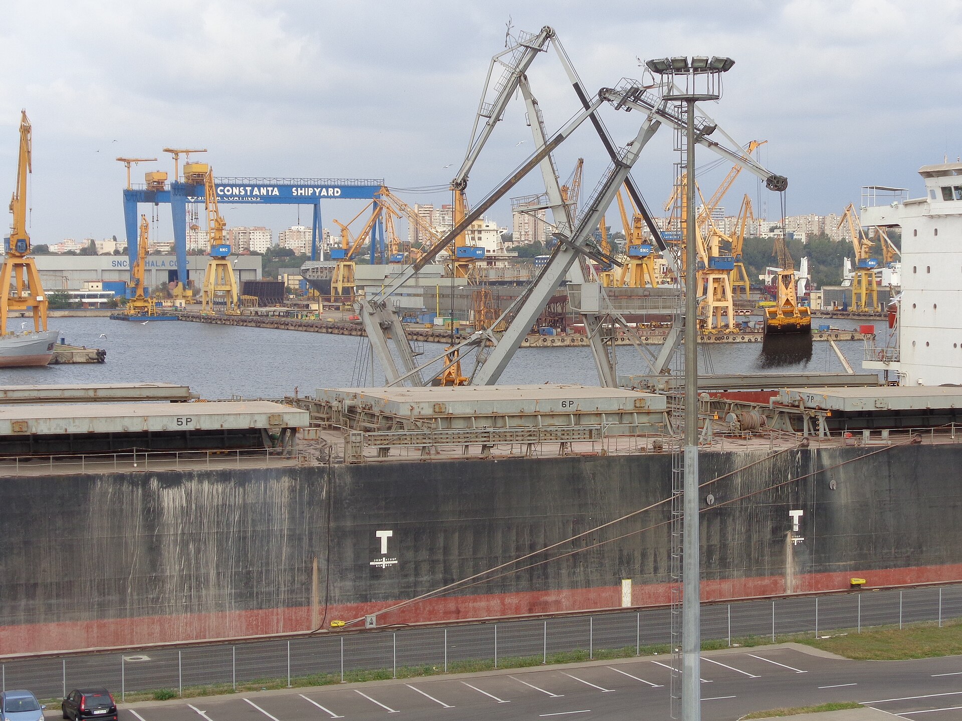 Cargo ship and loading cranes at Constanța Shipyard, Romania
